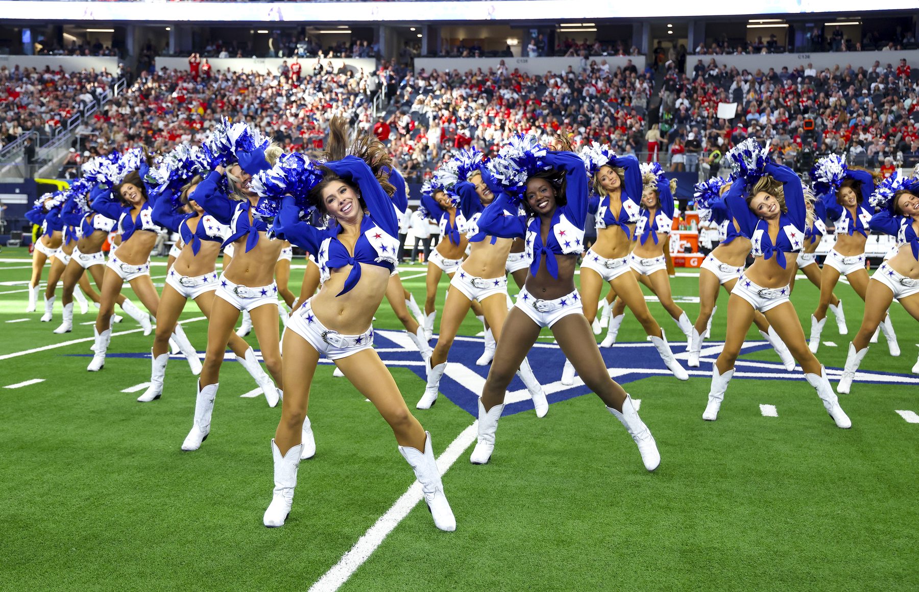 Dallas Cowboys Cheerleaders performing on the field