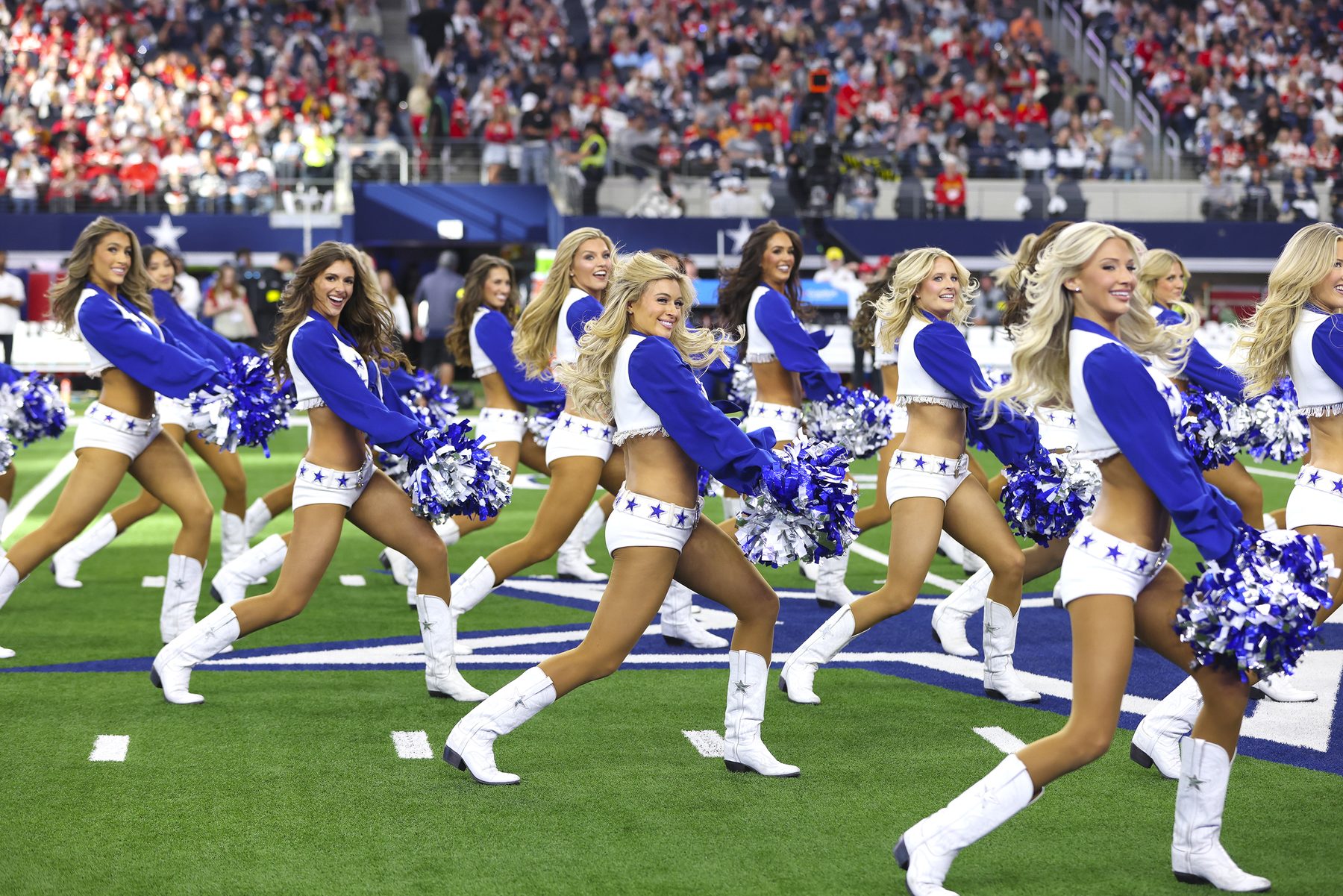 Dallas Cowboys Cheerleaders group performance on the field