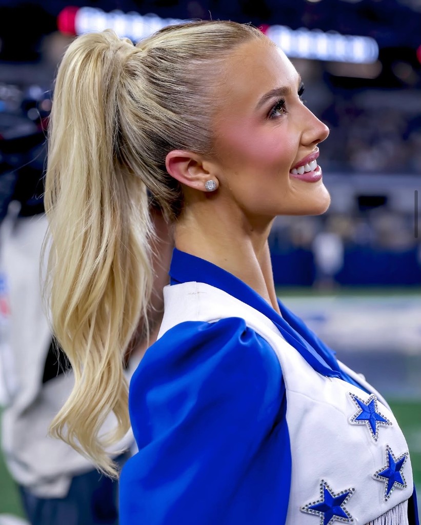 Dallas Cowboys Cheerleader portrait with blonde ponytail